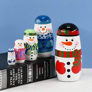 Handcrafted 5-piece Christmas snowman nesting dolls for festive wooden home decor