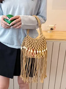 Chic khaki hand-woven bucket bag with decorative beads and long flowing tassels