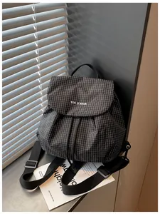 Lightweight black and white plaid backpack for women with YOU JI BEAR logo detail
