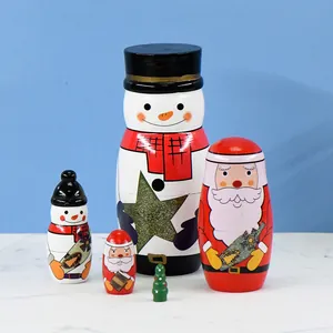 Set of 5 Christmas wooden nesting dolls featuring snowman and Santa Claus designs