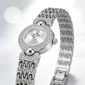 Close-up of luxury silver ladies watch with crystal bezel and unique link strap