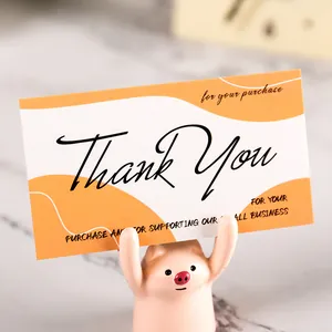 Professional thank you card for small business featuring a stylish orange abstract wave design