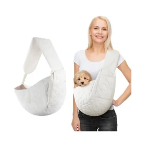 Detail of white quilted pet sling carrier with adjustable shoulder strap for dogs
