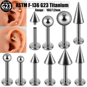 Detailed view of G23 titanium labret studs with various ball and cone ends in 16G size