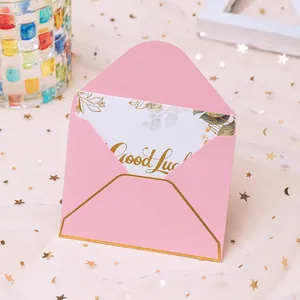 Elegant pink European style mini envelope with gold foil trim and Good Luck card insert