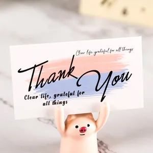 Minimalist business thank you card featuring a colorful brushstroke design and grateful slogan