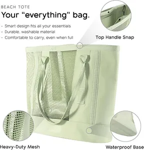 Detailed view of a large mint green mesh beach tote bag with a durable waterproof base.