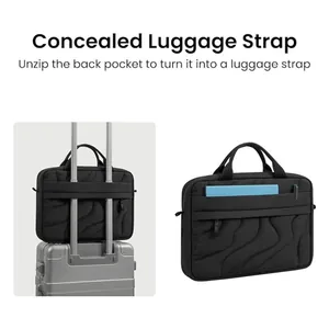 Detail view of the functional concealed luggage strap on this black puffy laptop sleeve bag