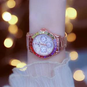 Luxury rose gold watch for women with rainbow gemstone bezel and crystal dial
