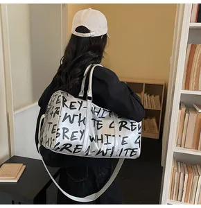 Stylish silver metallic gym bag for women with large capacity and graffiti letter print