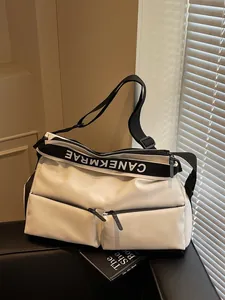 Stylish white multi-pocket crossbody sports bag for professional gym and travel