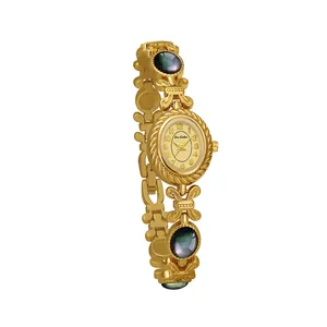 Reloj de pulsera de lujo Bee Sister dorado con incrustaciones de abulón negro natural.