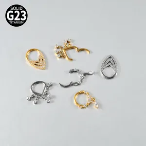 Polished G23 titanium nose rings and earrings with tassel and marquise zircon.