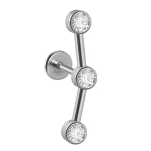 Curved stainless steel threadless push-pin labret stud with three sparkling CZ stones