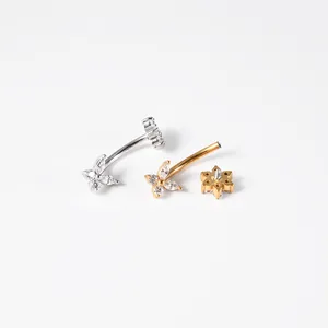 Close-up detail of internal threaded 16g piercing jewelry with zircon butterfly flower