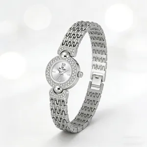 Detailed macro shot of vintage silver women's watch with shimmering crystal bezel