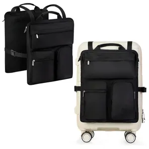 Schwarze multifunktionale Reisegepäck-Organizer-Tasche an einem weißen Koffer