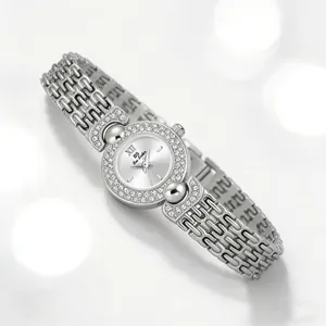 Close-up view of a silver women's watch featuring a rhinestone dial and luxury vintage chain strap