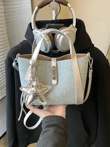 Exquisite light blue denim bucket bag with rhinestones and a silver star charm for women