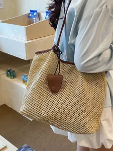 Borsa tote estiva in paglia intrecciata con manici in pelle per vacanze e tempo libero