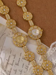 Exquisite vintage flower-shaped bracelet watch featuring shimmering crystal accents and gold finish