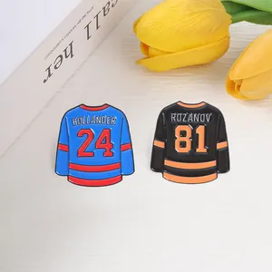 Custom hockey jersey enamel pins featuring Hollander 24 and Rozanov 81 designs