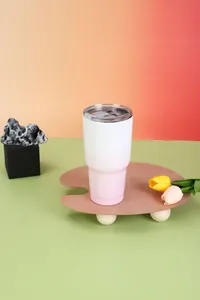 30oz vacuum insulated stainless steel tumbler featuring a white to pink gradient finish