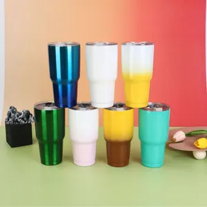 Set of vibrant 30oz gradient vacuum insulated stainless steel travel tumblers in various colors.