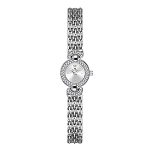 Elegant silver women's watch with crystal-encrusted bezel and retro bracelet