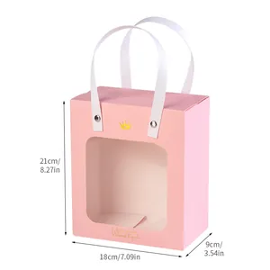 Pink paper gift bag with transparent window, gold foil crown logo, size 21x18x9cm