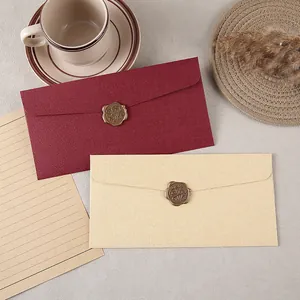 Vintage linen texture envelope and letter paper set with bronze Thank You wax seals.