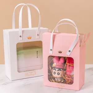 Elegant bronzed gift bag with clear window and ribbon handle for weddings or birthdays