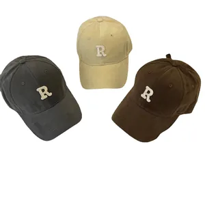 Stylish set of three cotton baseball caps with embroidered R logo for unisex wear