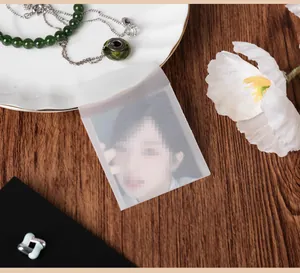 Detail of semi-transparent vellum paper envelope bag for jewelry and card storage