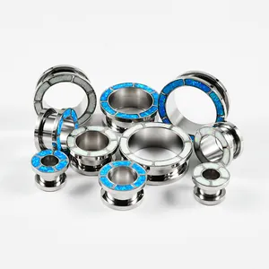 Elegantes dilatadores de oreja de acero inoxidable con incrustación de opalo azul