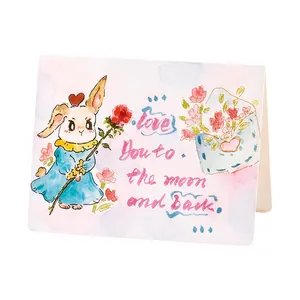 Hand-painted watercolor greeting card with cute rabbit and 'Love you to the moon and back'