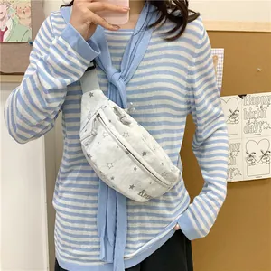 Star pattern casual crossbody chest bag shown on model in a trendy lifestyle setting