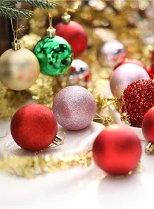 Detailed close-up of assorted festive Christmas baubles with matte and glitter textures