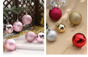 Macro view of assorted Christmas ball ornaments in matte, shiny, and glitter textures