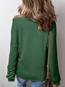 Close-up back view of a green waffle knit long sleeve top with off-shoulder design