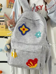 Light grey student backpack with cute colorful flower embroidery and bear keychain