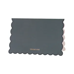 Elegant Morandi grey thank you card featuring gold foil lettering and decorative scalloped edges