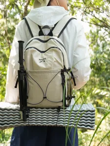 Sac à dos de randonnée léger beige à carreaux pour le camping et les activités de plein air