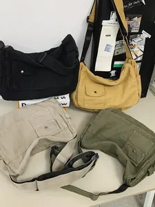 Multi-color canvas messenger bags featuring large capacity and adjustable wide shoulder straps