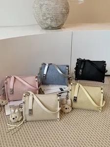 Trendy collection of women's crossbody pillow bags in assorted vibrant summer colors