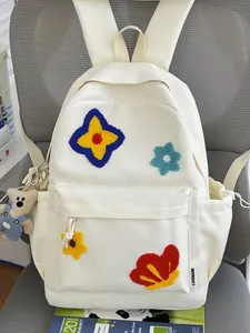Cream white student backpack with cute colorful flower embroidery and bear pendant