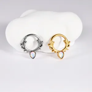 Antler septum clicker rings in gold and silver stainless steel with teardrop opal