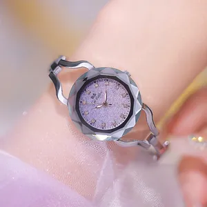 Elegant women's purple glitter dial watch with faceted glass and silver bangle strap