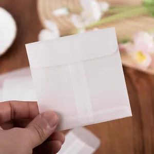 Small square semi-transparent vellum paper envelope for jewelry and card packaging storage
