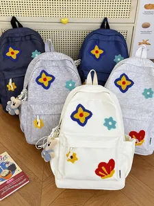 Cute student schoolbag with colorful star patches and bear charm in various colors
